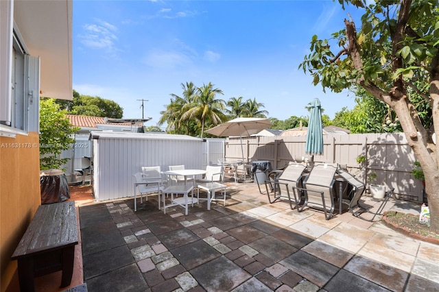 2901 SW 21st St, Miami, FL 33145 - fenced backyard featuring a patio area and outdoor dining space