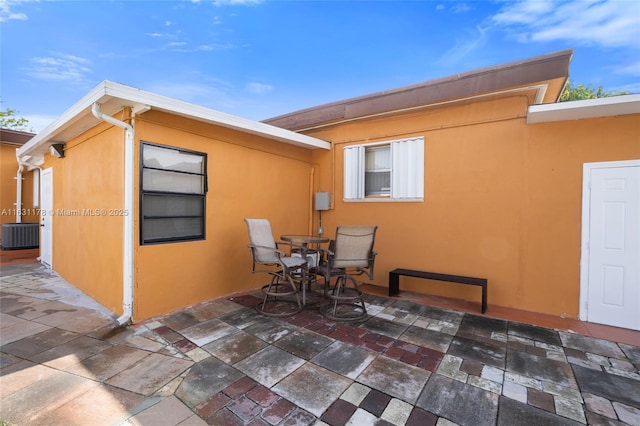 view of patio / terrace with central AC unit