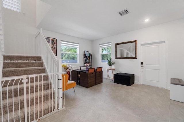 home office with light tile patterned flooring