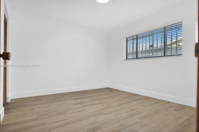 empty room with light wood-type flooring