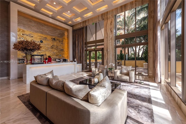 tiled living room featuring a high ceiling, beam ceiling, and coffered ceiling