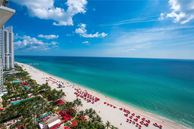 bird's eye view with a view of the beach and a water view