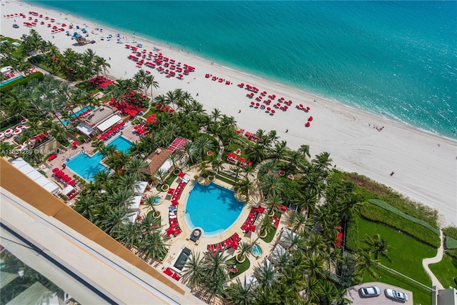 bird's eye view with a beach view and a water view