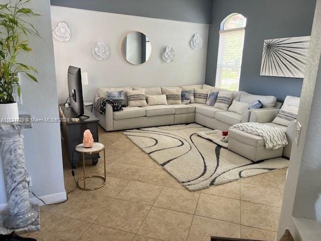 living room with light tile patterned floors