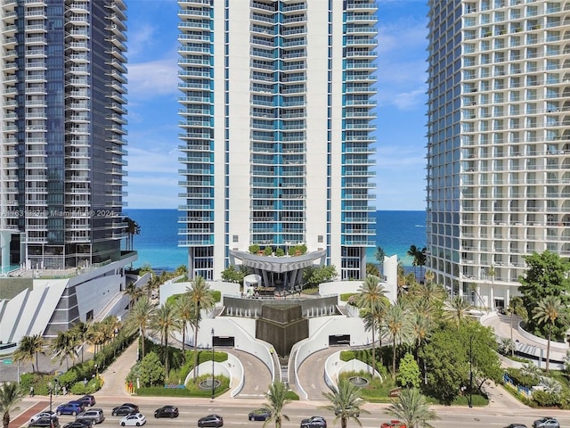 view of building exterior featuring a water view