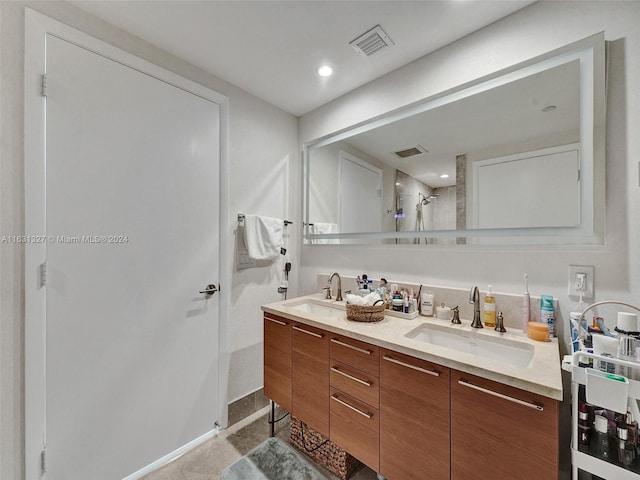 bathroom featuring double vanity