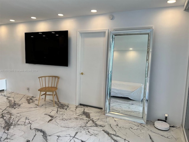 living room with tile patterned floors