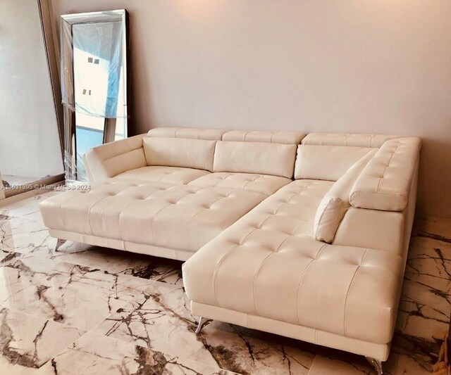 living room featuring light tile patterned floors