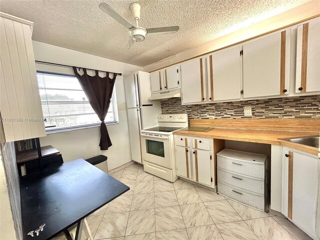 7480 NW 17th St Unit 305, Plantation, FL 33313 - corridor featuring a textured ceiling and light tile patterned floors