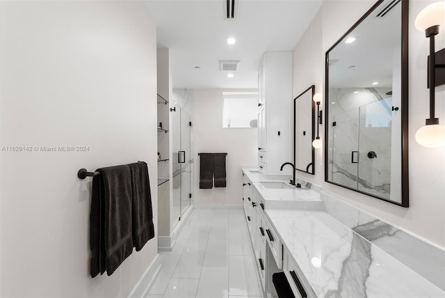 bathroom featuring vanity and walk in shower