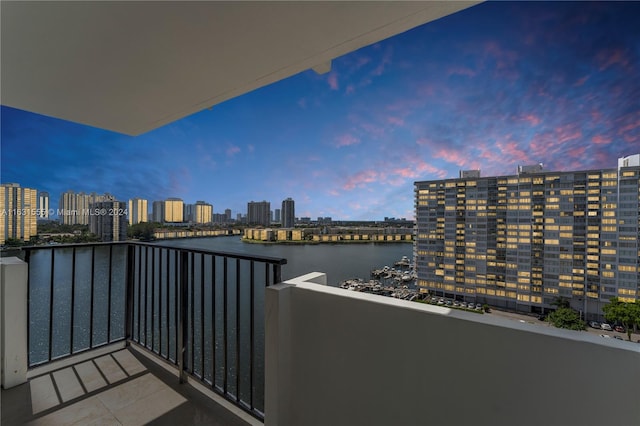 balcony at dusk with a water view