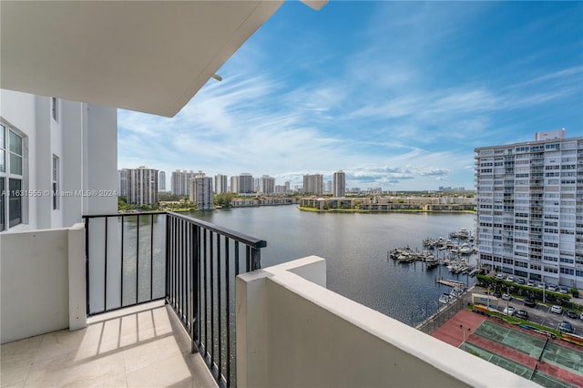 balcony featuring a water view