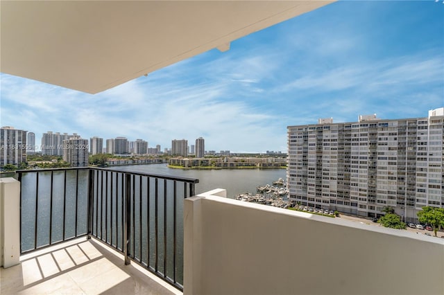 balcony featuring a water view