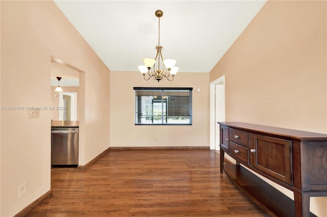 unfurnished dining area with lofted ceiling, hardwood / wood-style floors, and a chandelier