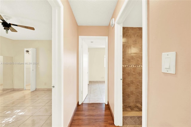 hallway featuring hardwood / wood-style floors