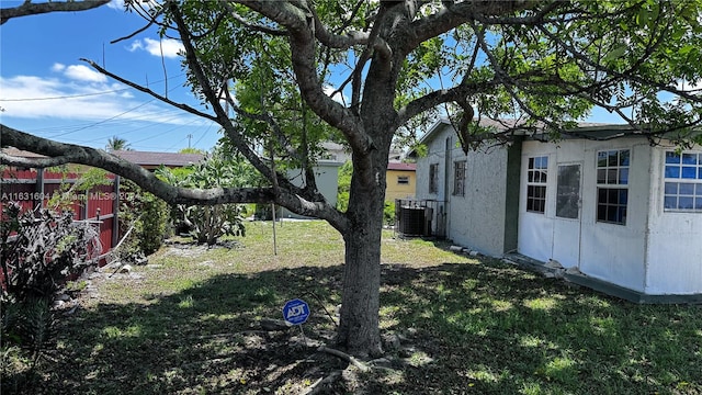 view of yard with central AC