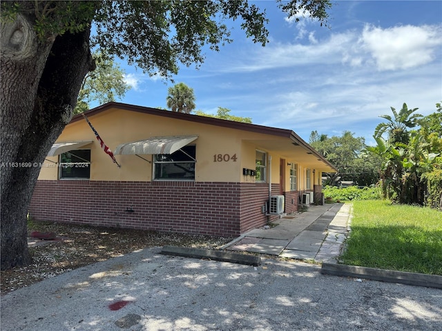 view of front of home with central AC