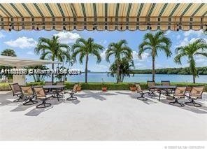 view of patio featuring a water view