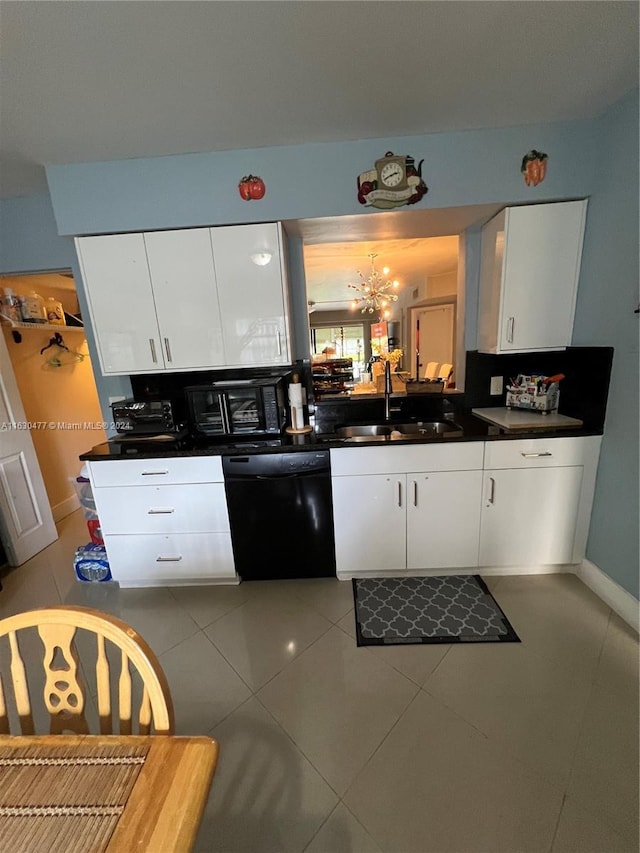 kitchen featuring light tile patterned flooring, black dishwasher, sink, and white cabinets