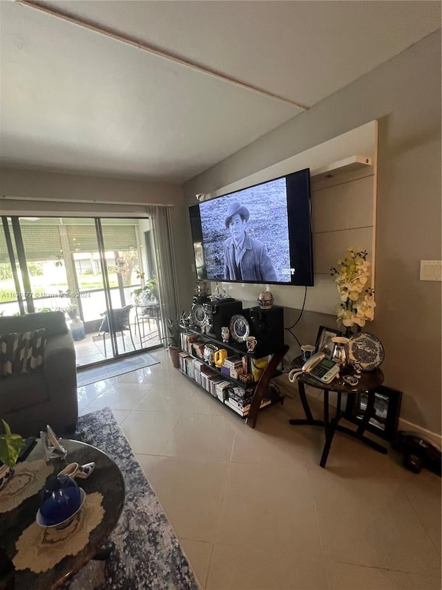 living room with tile patterned floors