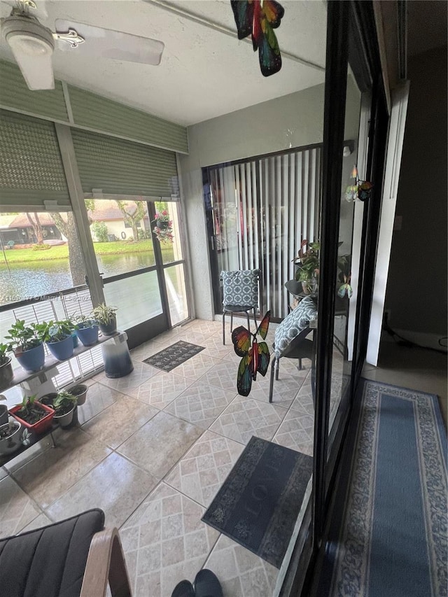 sunroom with a water view