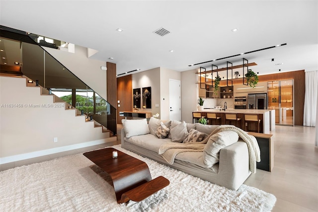 living room featuring light tile patterned flooring