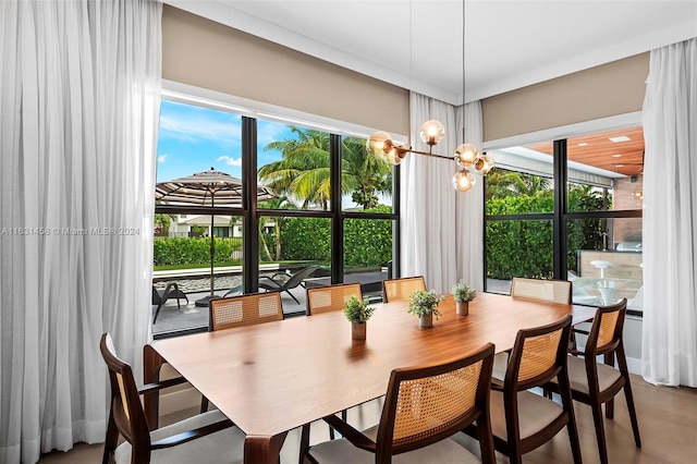 dining area with an inviting chandelier