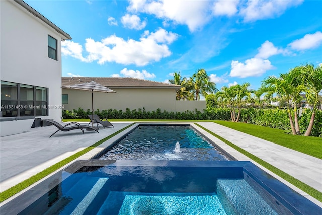 view of swimming pool with an in ground hot tub and pool water feature