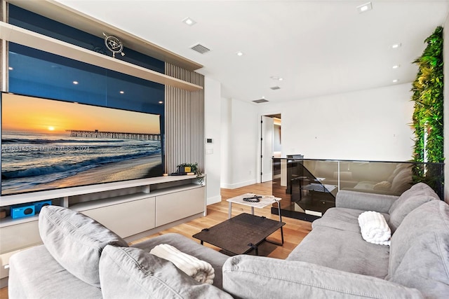 living room with light hardwood / wood-style floors