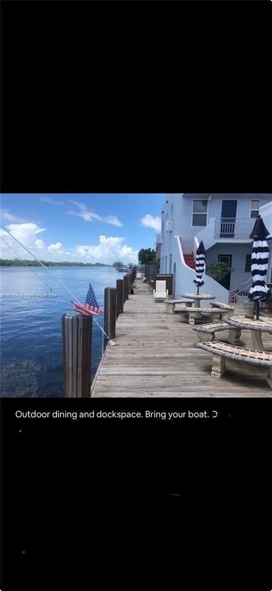 view of dock with a water view