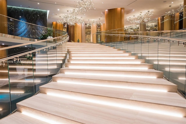 stairs featuring hardwood / wood-style flooring