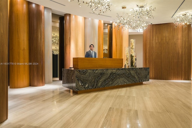 welcome area with an inviting chandelier