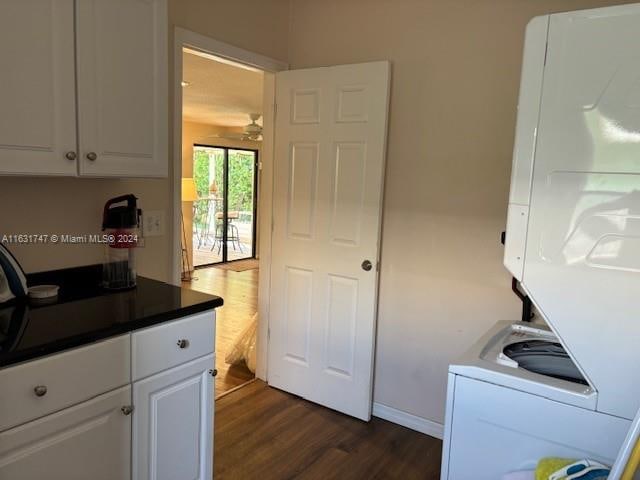 kitchen with white cabinetry, ceiling fan, and dark wood-type flooring