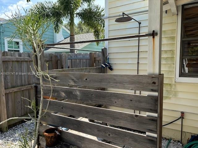 exterior details featuring wood walls