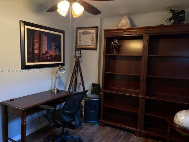 home office featuring ceiling fan and dark hardwood / wood-style flooring