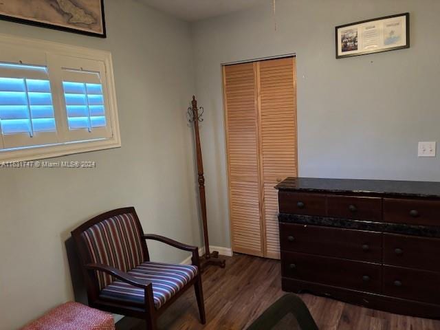 living area featuring dark hardwood / wood-style flooring