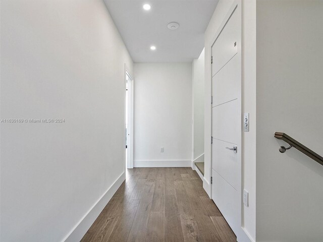 hall featuring hardwood / wood-style flooring