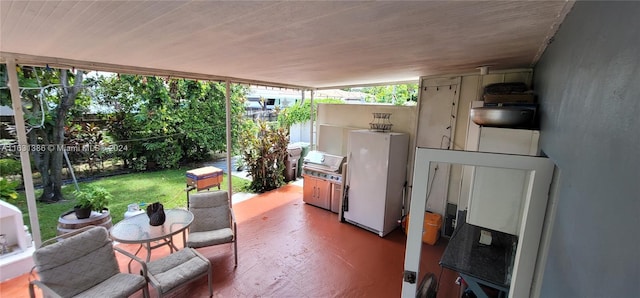 view of patio with exterior kitchen and grilling area