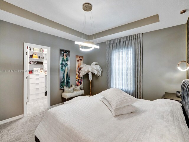 4414 Ficus St, Hollywood, FL 33021 - carpeted bedroom featuring baseboards and a tray ceiling