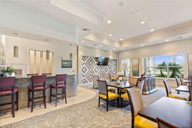 4414 Ficus St, Hollywood, FL 33021 - dining room featuring visible vents, ornamental molding, recessed lighting, a tray ceiling, and light colored carpet