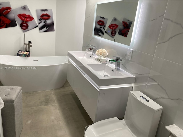 bathroom featuring dual vanity and tile patterned flooring