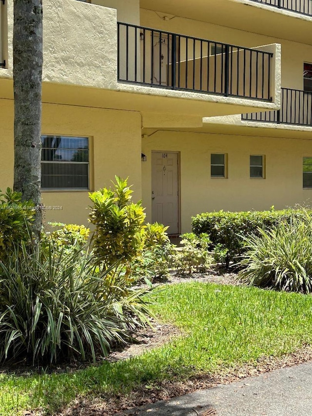 doorway to property with a balcony