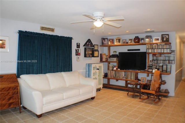 living room featuring ceiling fan