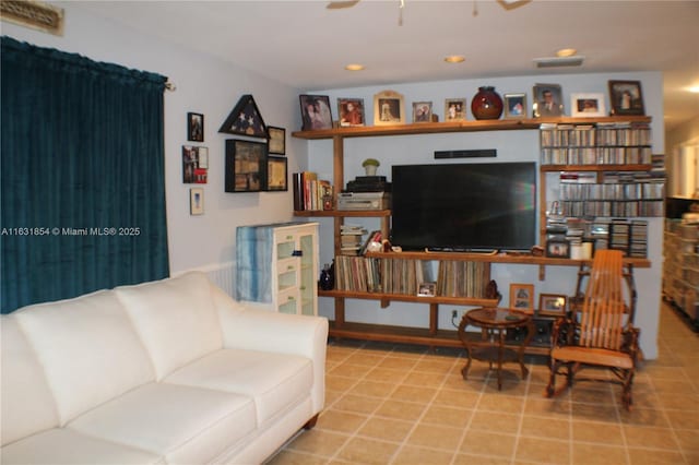 living room featuring ceiling fan