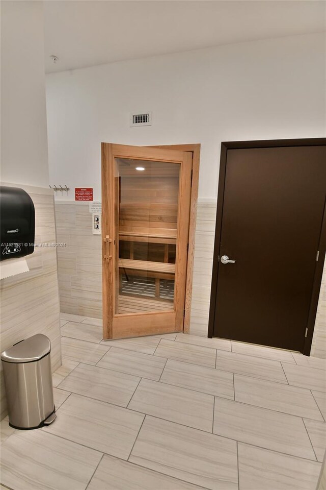 bathroom with tile patterned floors