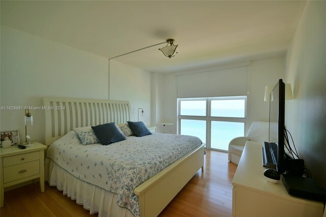 bedroom with light wood-type flooring