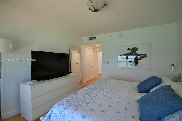 bedroom featuring light wood-type flooring