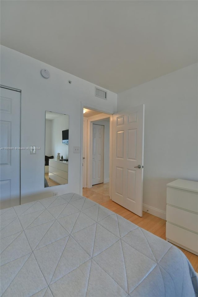 unfurnished bedroom featuring light hardwood / wood-style floors