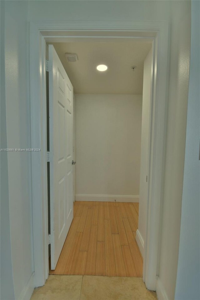 hallway featuring light hardwood / wood-style floors