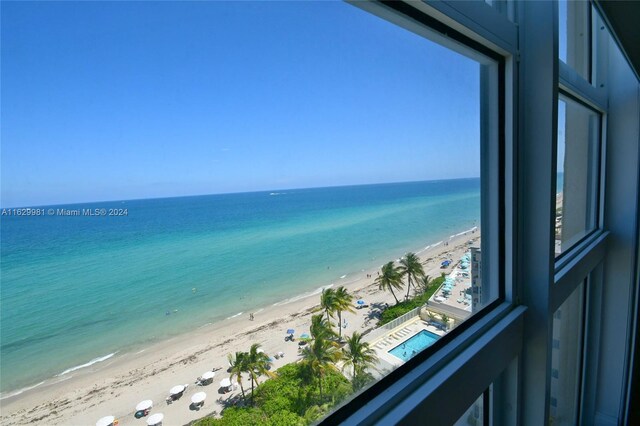 view of water feature with a beach view